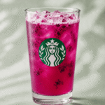 Starbucks Mango Dragonfruit Lemonade Energy Refresher with dragonfruit pieces