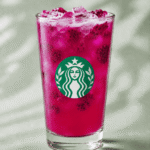 Starbucks Mango Dragonfruit Lemonade Refresher with dragonfruit pieces